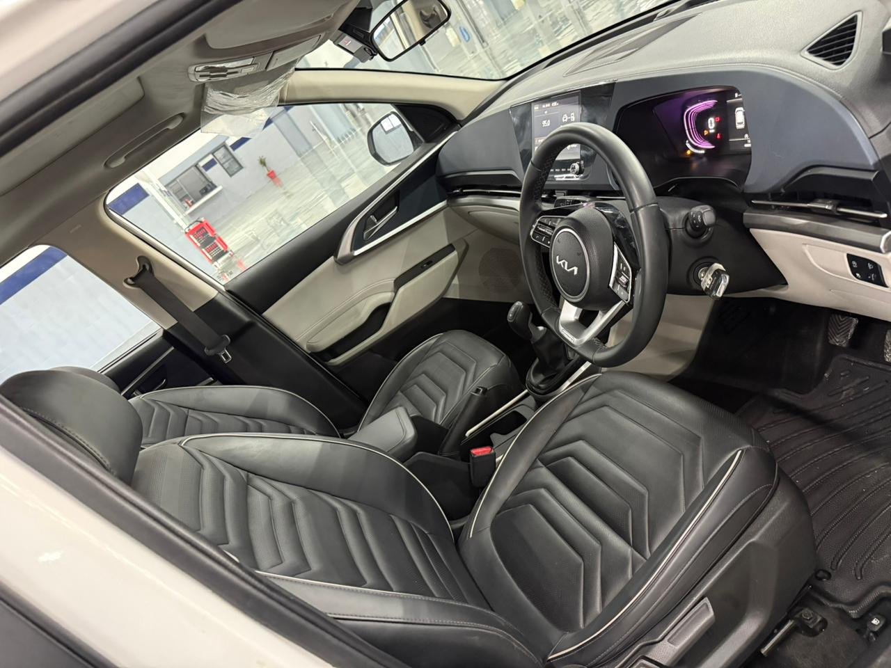 
								“Caren G1.5 6MT in Gravity White – Now at AM KIA Jammu!” full									