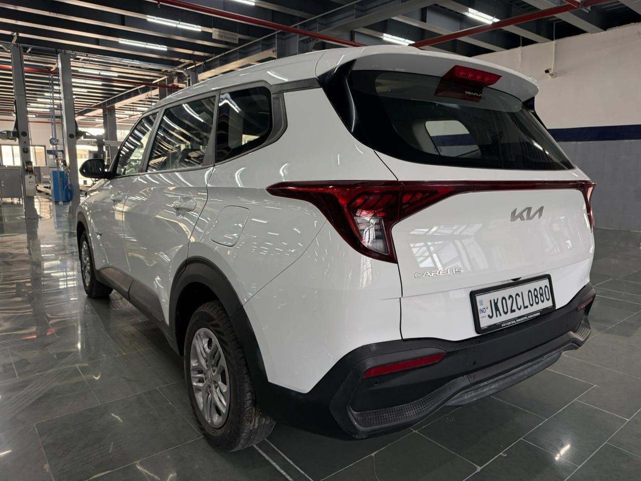 
								“Caren G1.5 6MT in Gravity White – Now at AM KIA Jammu!” full									