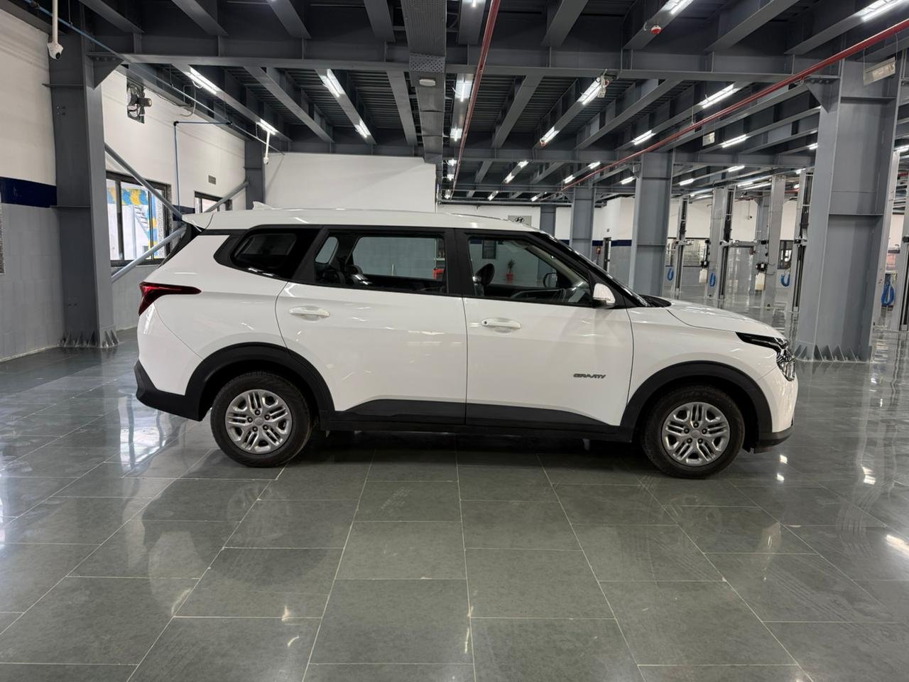 
								“Caren G1.5 6MT in Gravity White – Now at AM KIA Jammu!” full									