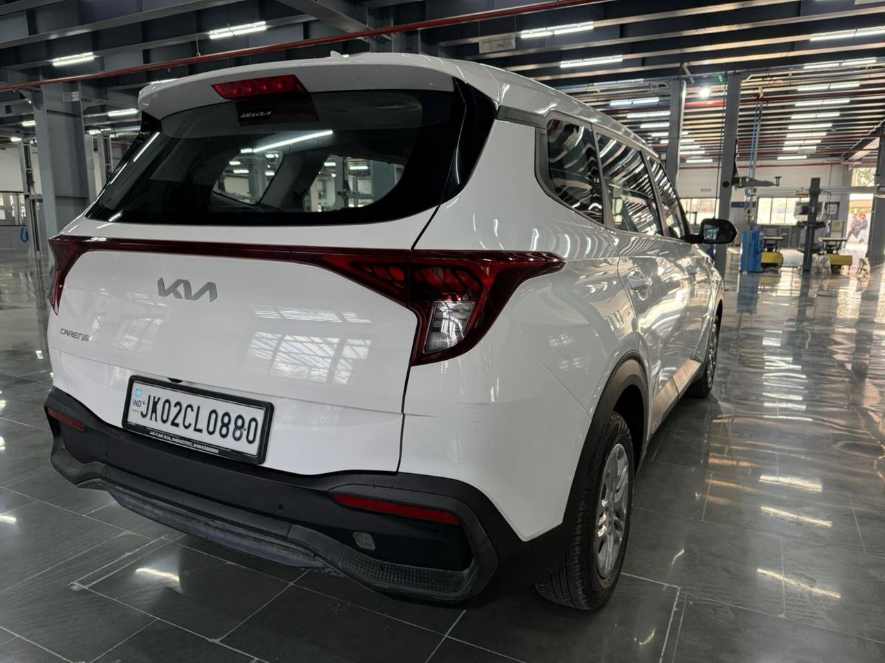 
								“Caren G1.5 6MT in Gravity White – Now at AM KIA Jammu!” full									